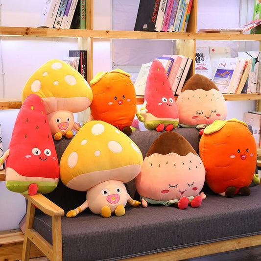 Set of colorful plush toys shaped like fruits and vegetables on a couch with a bookshelf in the background.