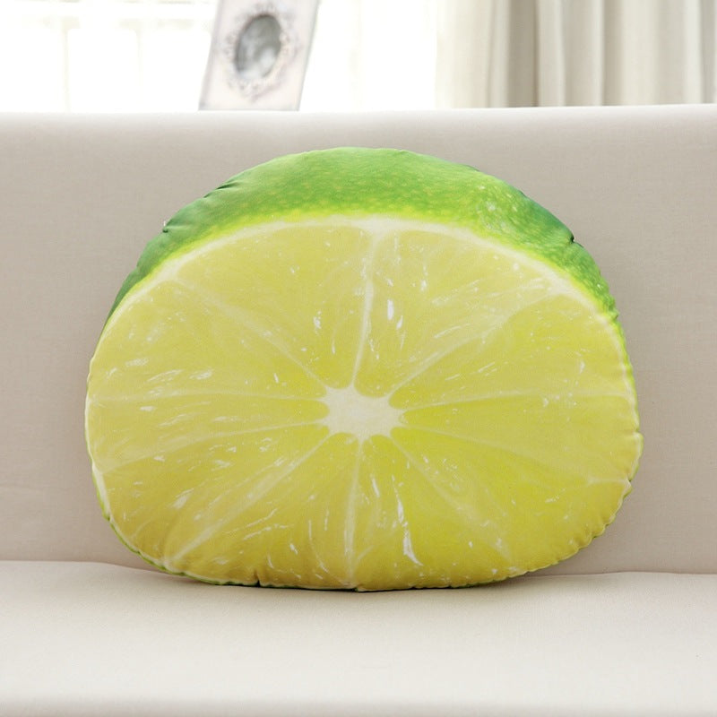 Round lime-shaped pillow on a beige sofa