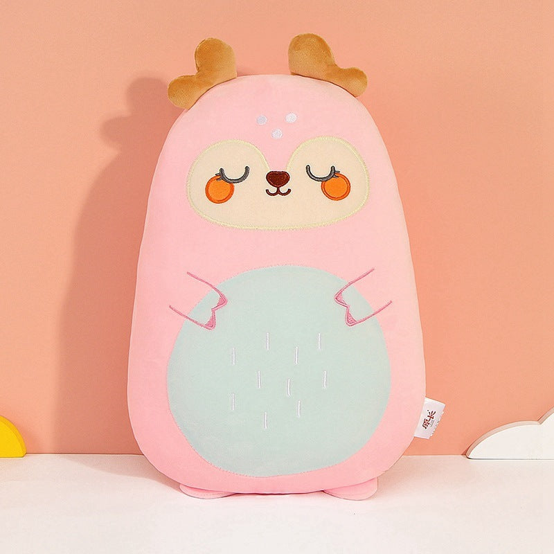 Cute plush toy with a pink shell, green body, and brown ears on a peach background